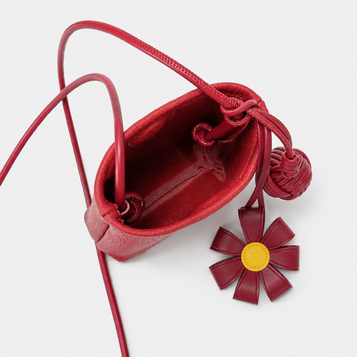 SICOPERT Small Crossbody Phone Bag with Woven Ball & Flower Charm
